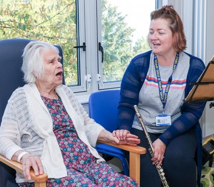 Alis and patient singing together