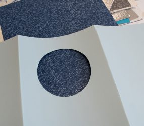 circle mount over blue textured paper