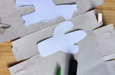 lay the paper templates onto cardboard