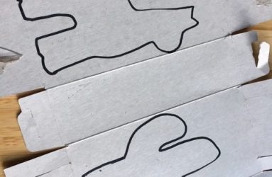 template shapes drawn onto cereal box card