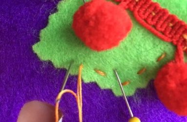 stitching the saddle on the llama