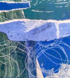 different colour blue papers layers and stitched together
