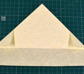 turn folded piece over