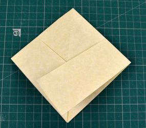 folded flat into square shape
