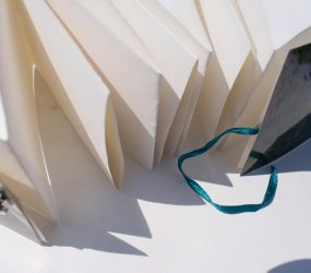 folded book left untied to show pages