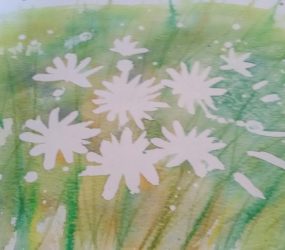 masking fluid removed to reveal white daisy shapes