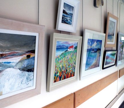 paintings hanging in corridor