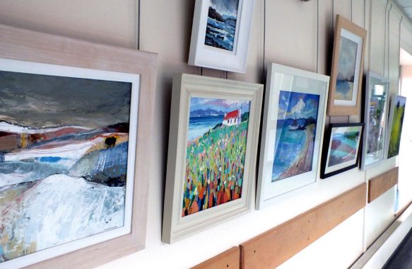 paintings hanging in corridor