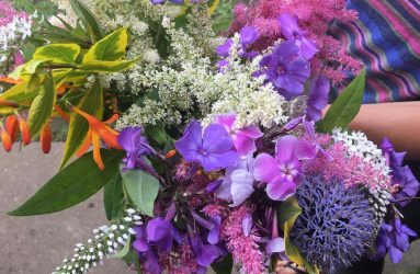 bunch of freshly picked pink, purple and white flowers