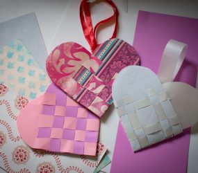 finished woven heart examples with ribbon attached for hanging