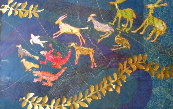 fabric animal pairs on background of blue textile