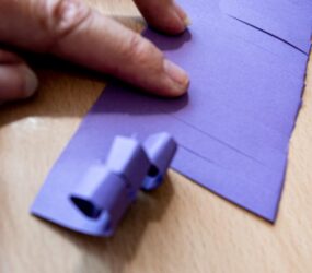 curling the cut ends of card