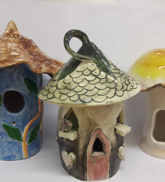 ceramic mushroom style bird houses, painted and glazed