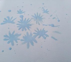first outline of watercolour daisy in masking fluid